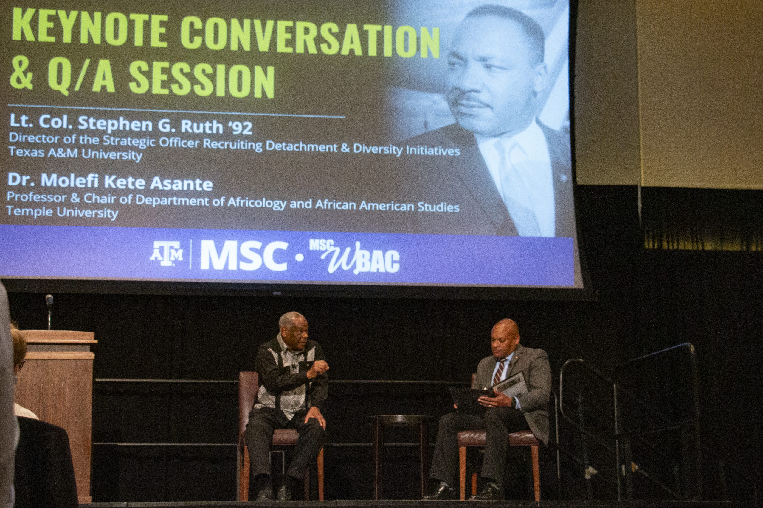 Dr. Asante and Col. Ruth discussing questions asked during the 15th annual Reverend Dr. Martin Luther King, Jr. Breakfast at Texas A&M University. Hosted by MSC WBAC.