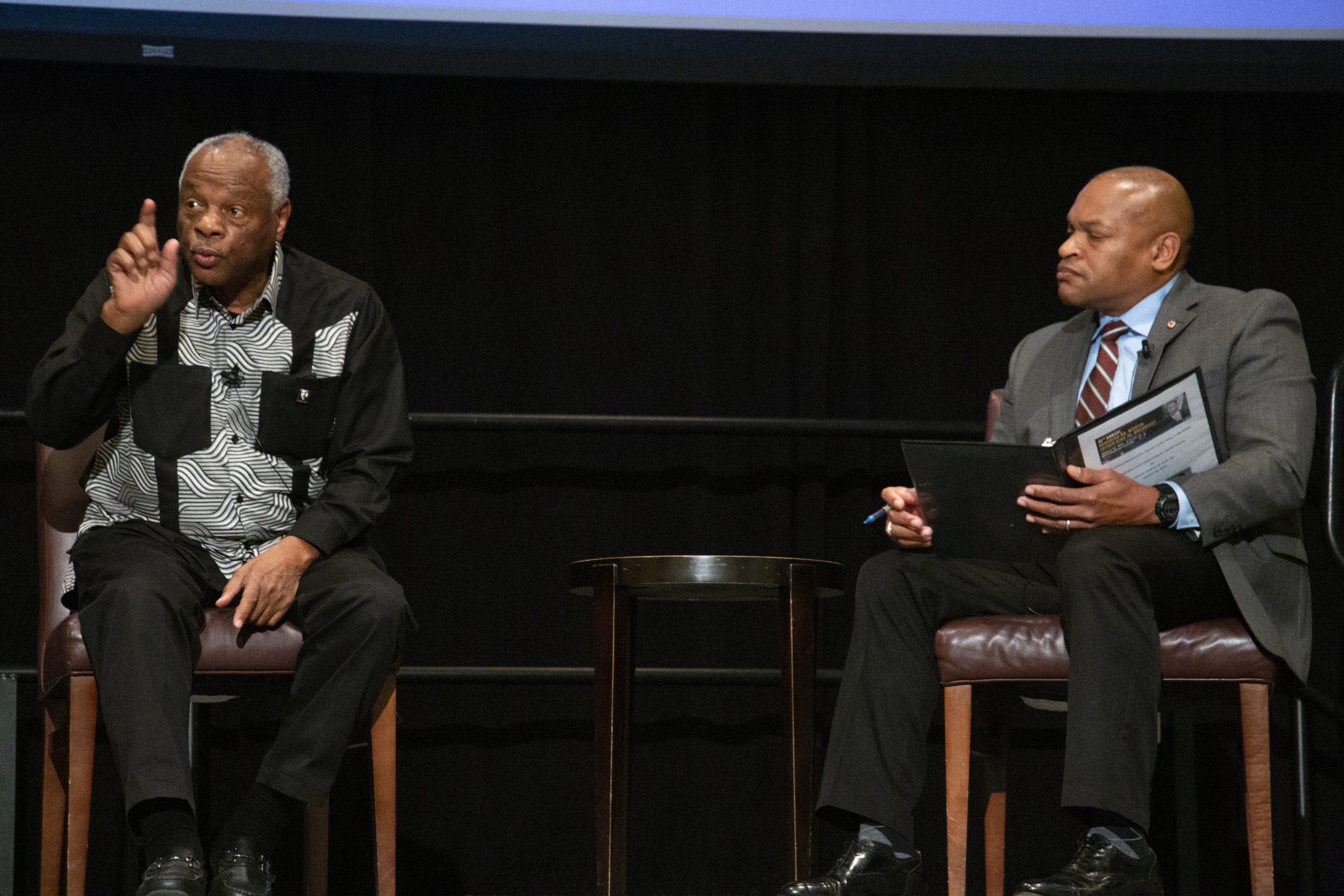 Dr. Asante and Col. Ruth discussing questions asked during the 15th annual Reverend Dr. Martin Luther King, Jr. Breakfast at Texas A&M University. Hosted by MSC WBAC.